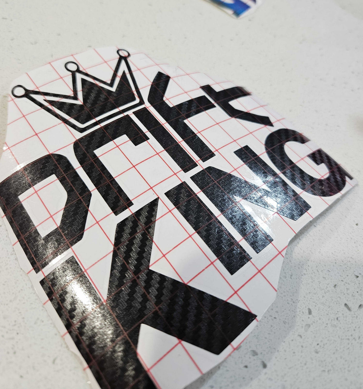 Drift King decal on car window featuring sleek design and durable outdoor vinyl