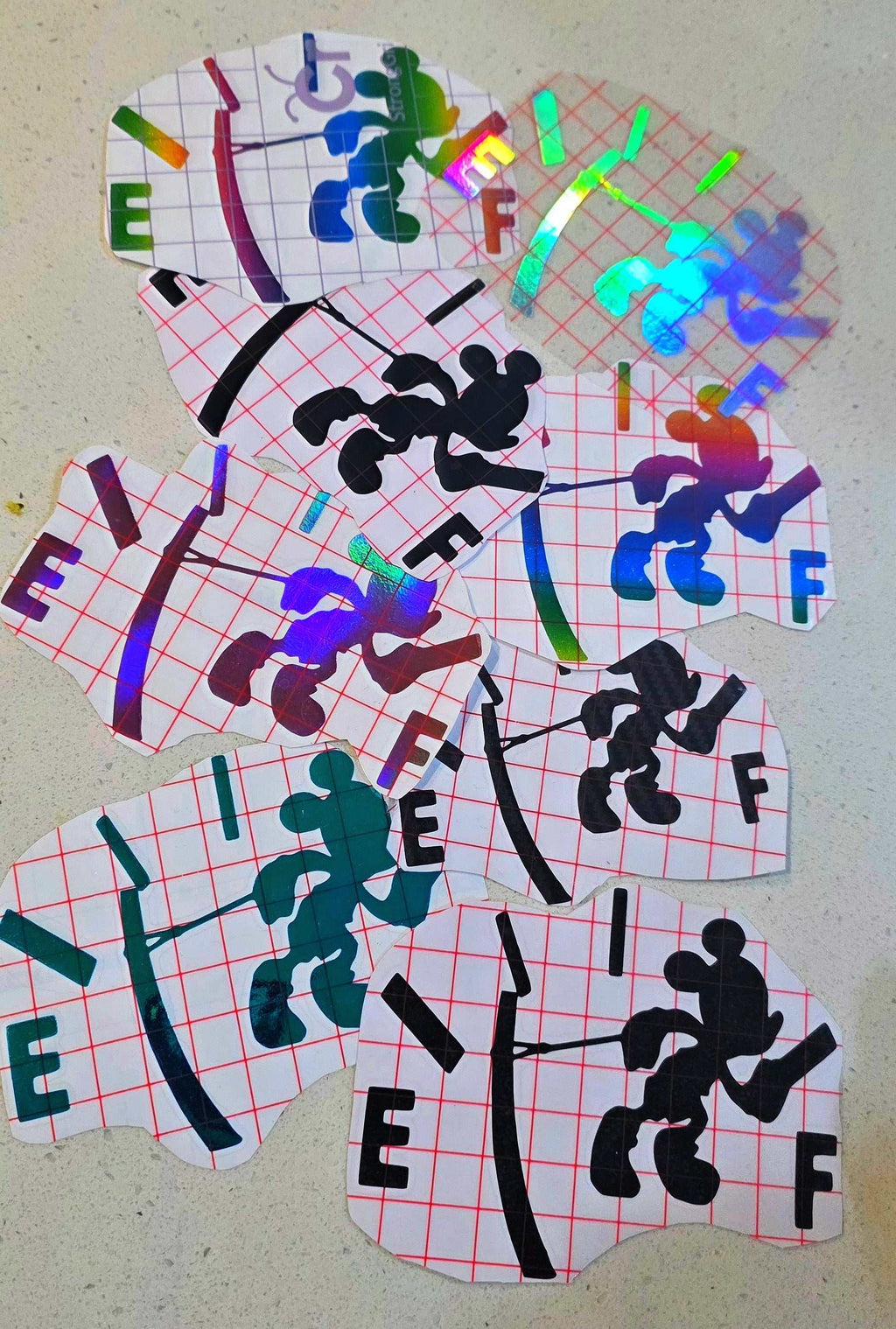 Mickey Mouse inspired decal with clean silhouette design and holographic finish on black background