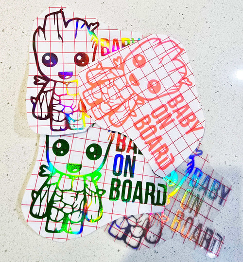 Baby Groot Baby On Board decal on a car window, weather-resistant and made from premium vinyl