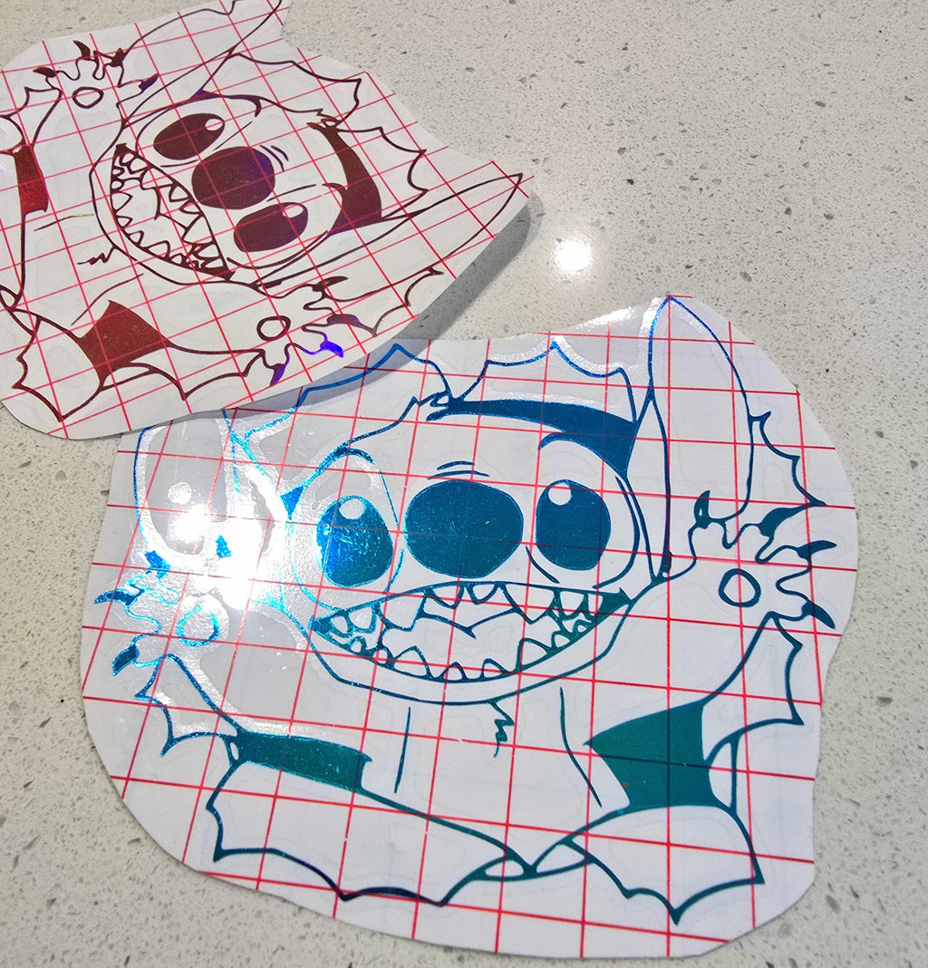 Stitch-inspired blue alien decal on a white background with bold design