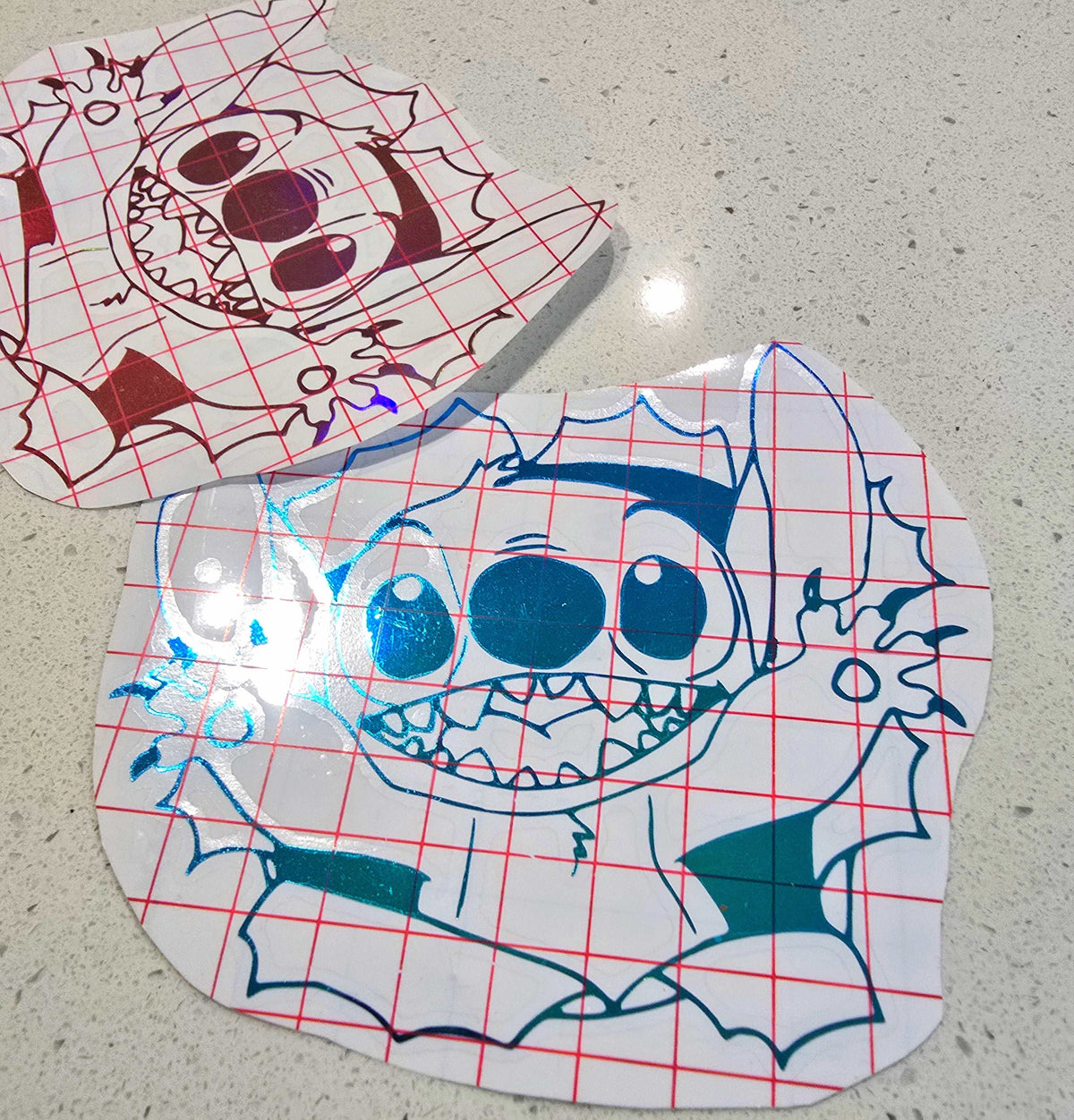 Stitch-inspired blue alien decal on a white background with bold design
