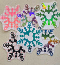 Mickey snowflake decal with mouse-ear design on a clear background