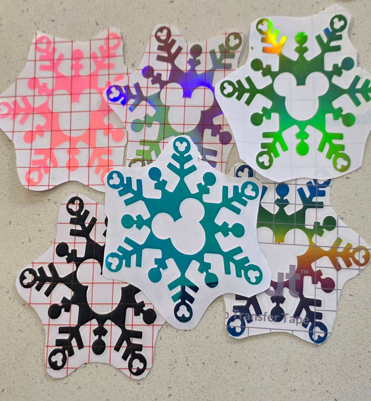 Mickey snowflake decal with mouse-ear design on a clear background