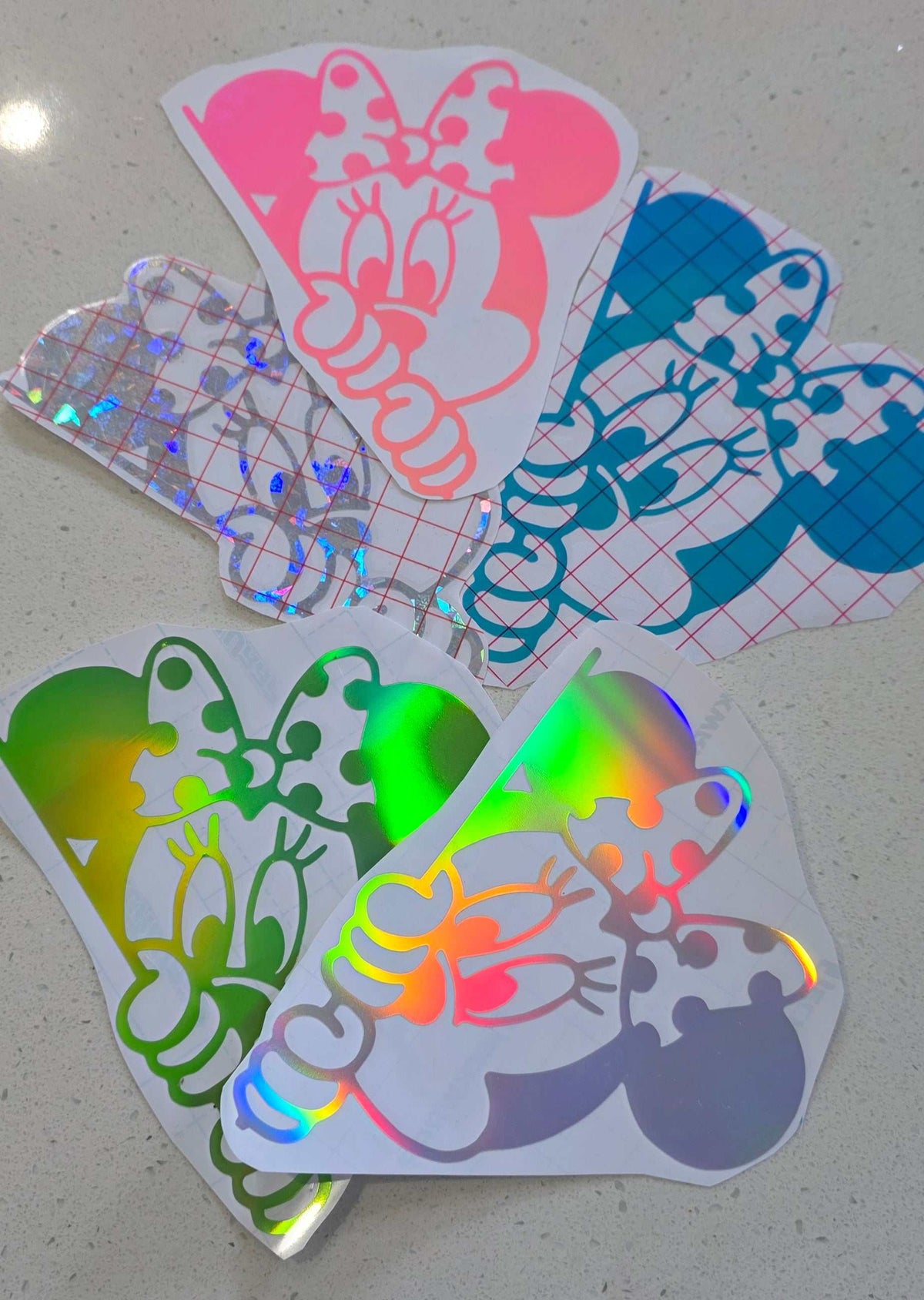 Character inspired Minnie transfer sticker on a laptop, colorful and playful design, outdoor-grade vinyl, weather and UV resistant, Australian made