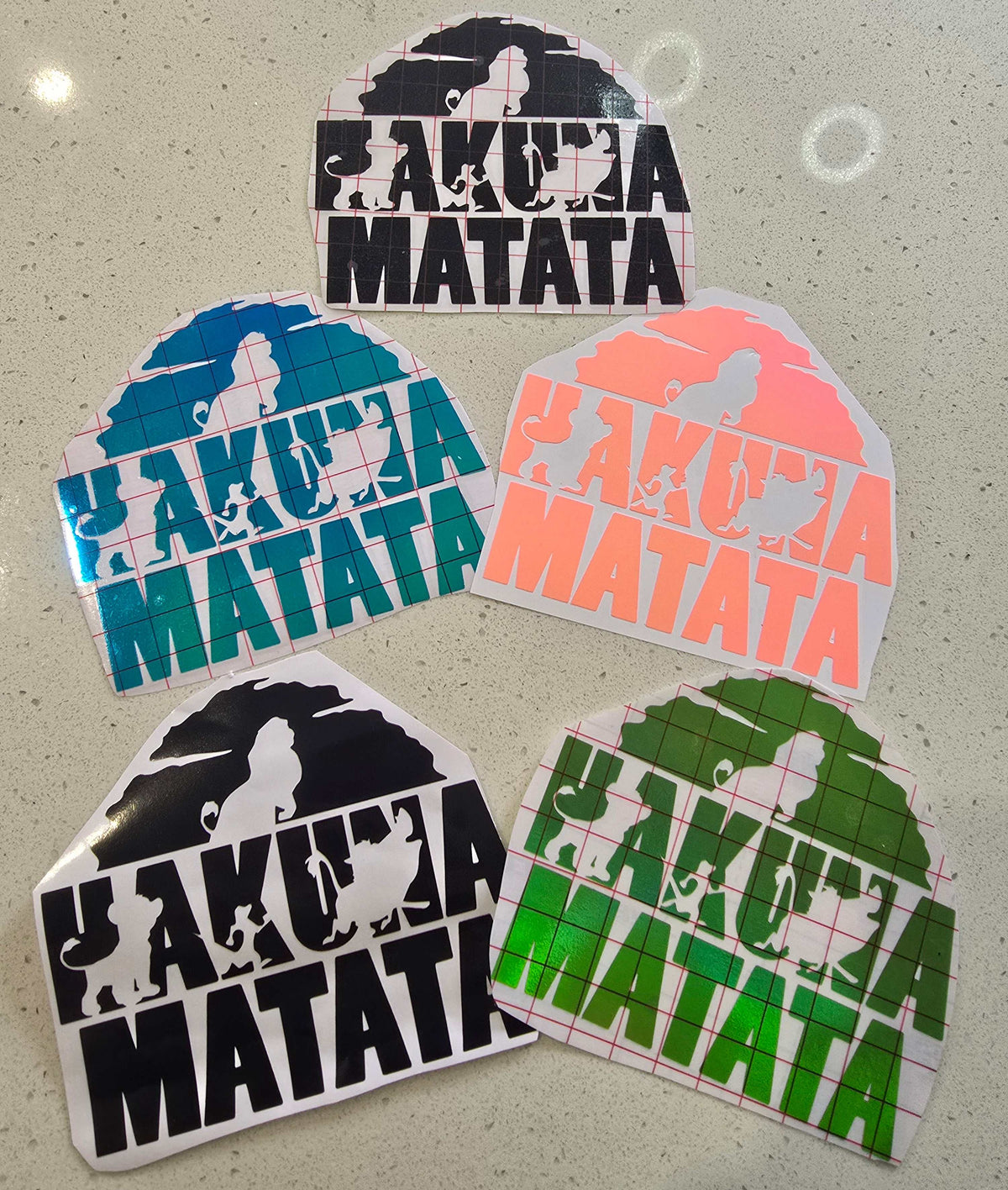 Hakuna Matata Lion King inspired green vinyl decal with playful character silhouettes and bold lettering