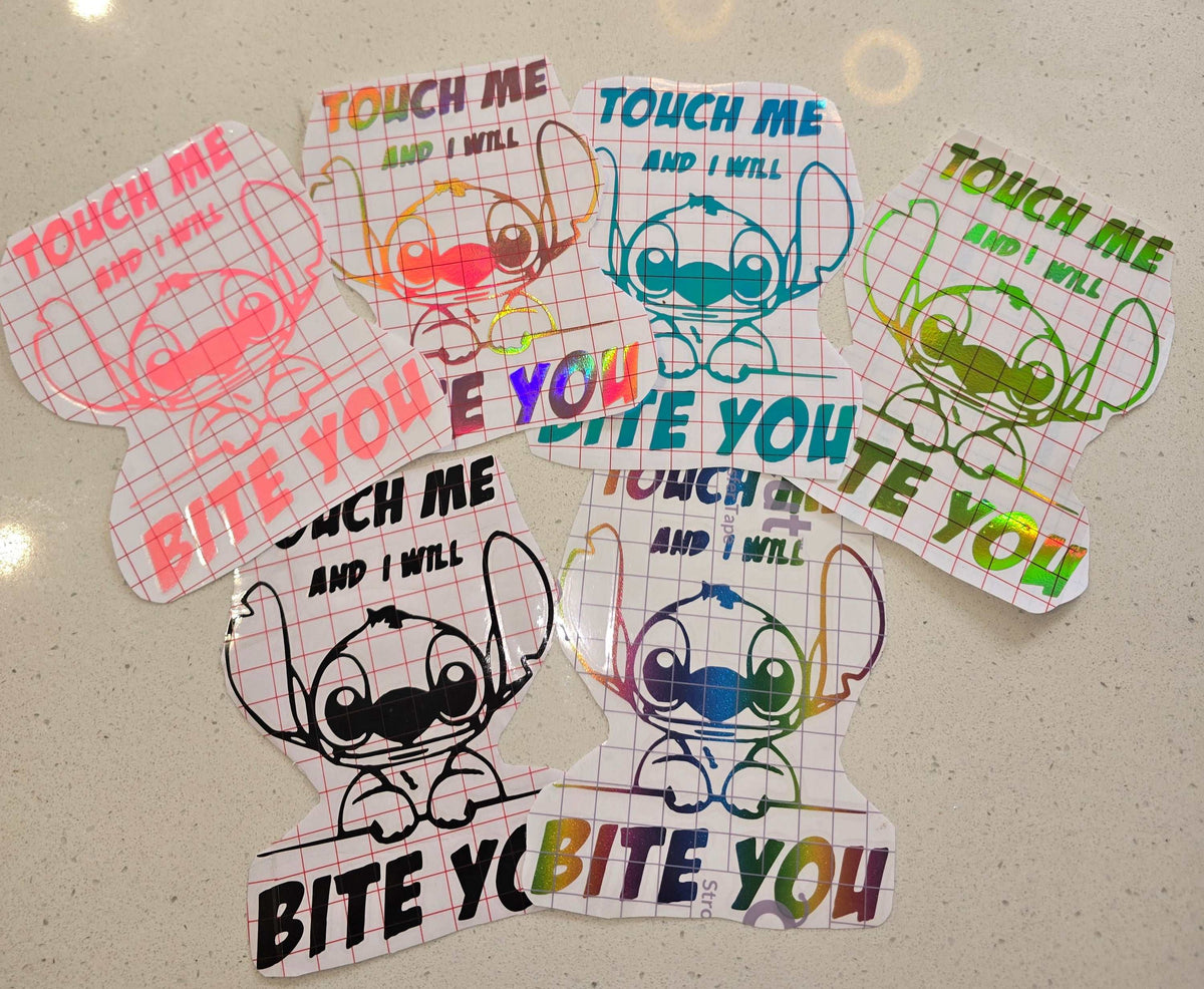 Cheeky Stitch inspired decal with "Touch Me & I Will Bite You" text, blue character design on outdoor-grade vinyl