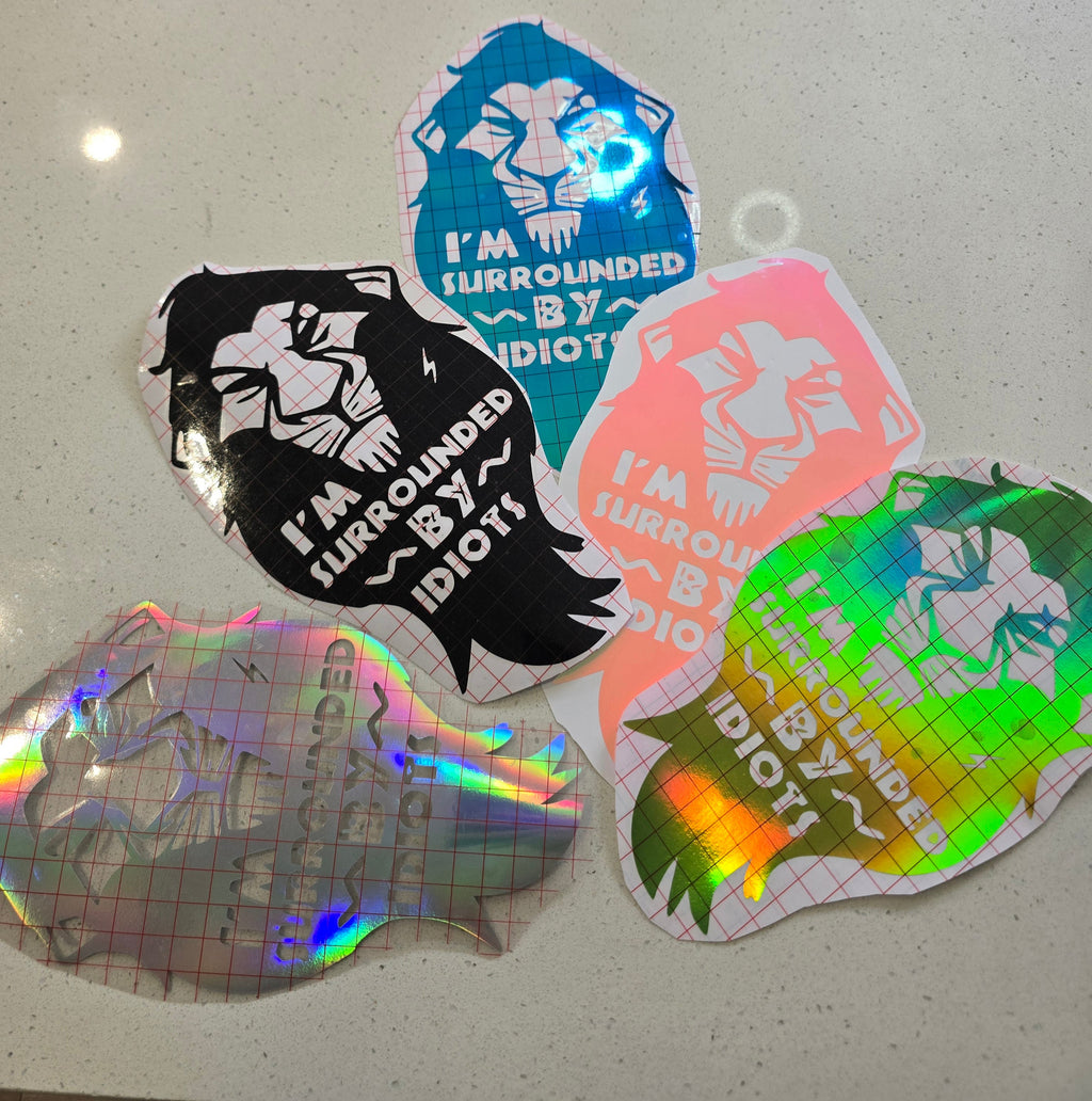 Lion King-inspired decal with "Surrounded by Idiots" quote, outdoor-grade vinyl, weather-resistant, bold design
